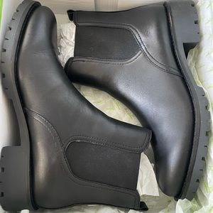 Never worn Chelsea black leather rain boots